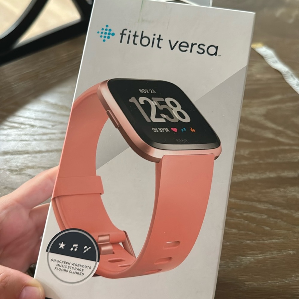 Fitbit Versa used but great condition - small and large bands